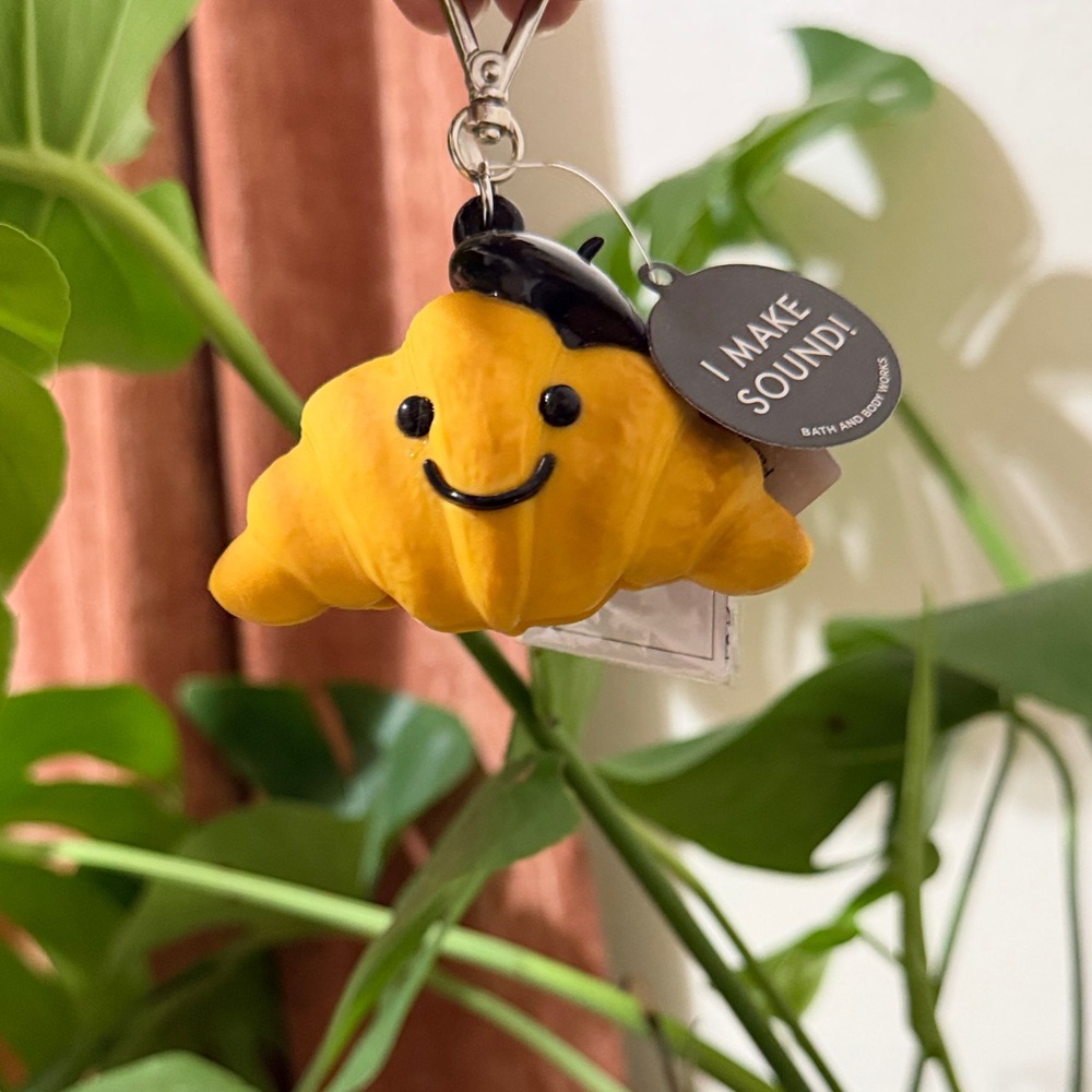 Bath & Body Works Yellow Smiling Croissant Sound Keychain